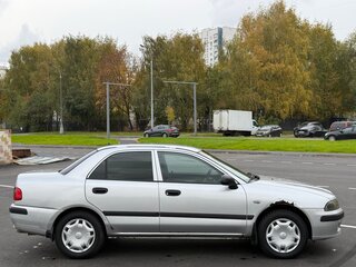 2002 Mitsubishi Carisma I Рестайлинг, серый, 220000 рублей, вид 4
