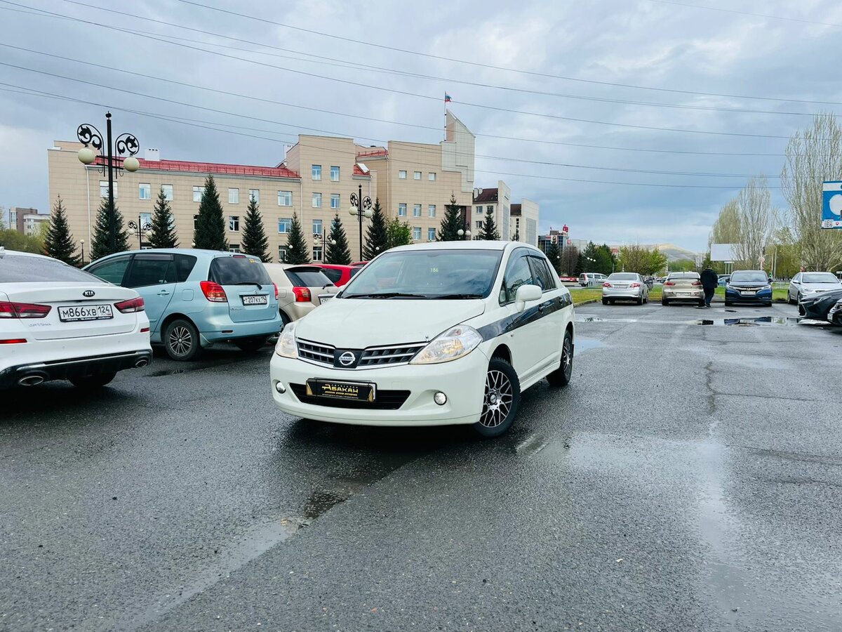 Открыть фотографии: Nissan Tiida I