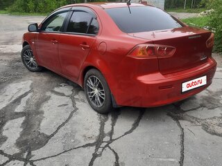 2008 Mitsubishi Lancer X, красный, 530000 рублей, вид 4