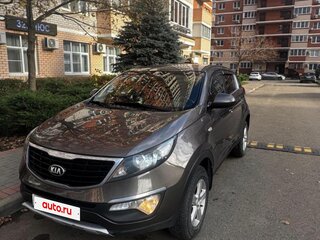 2015 Kia Sportage III Рестайлинг, коричневый, 1390000 рублей, вид 1
