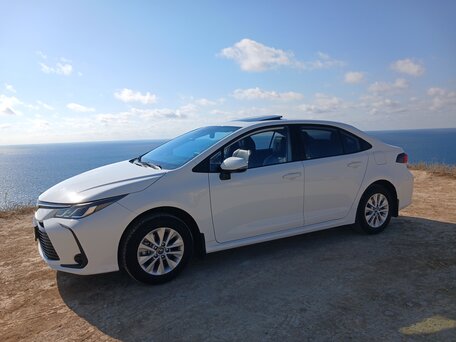 2020 Toyota Corolla XII (E210), белый, 1680000 рублей, вид 2