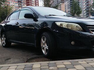 2007 Toyota Corolla X (E140, E150), чёрный, 600000 рублей, вид 3