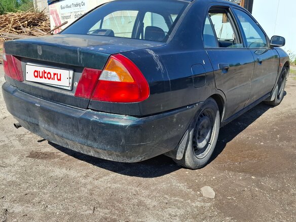 2000 Mitsubishi Lancer VII, зелёный, 90000 рублей - вид 1