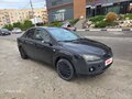 2007 Ford Focus II, чёрный - вид 1