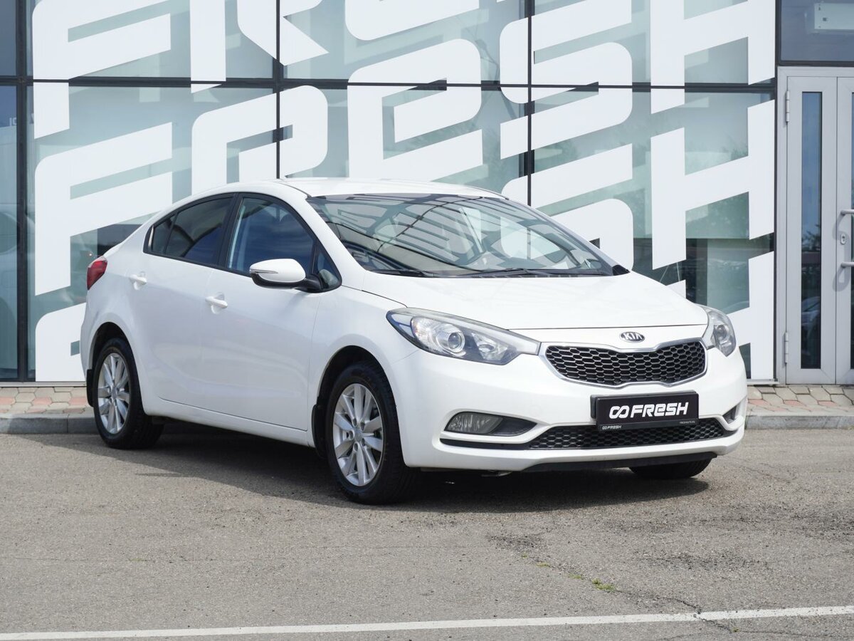 Открыть фотографии: Kia Cerato III