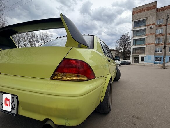2001 Mitsubishi Lancer IX, жёлтый, 170000 рублей - вид 13