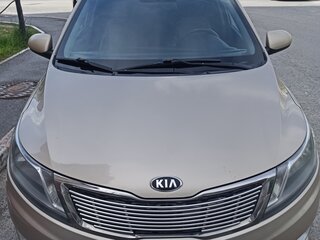 2014 Kia Rio 6-speed III, бежевый, 650000 рублей, вид 2