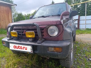 1996 Mitsubishi Pajero Junior, пурпурный, 650000 рублей, вид 1