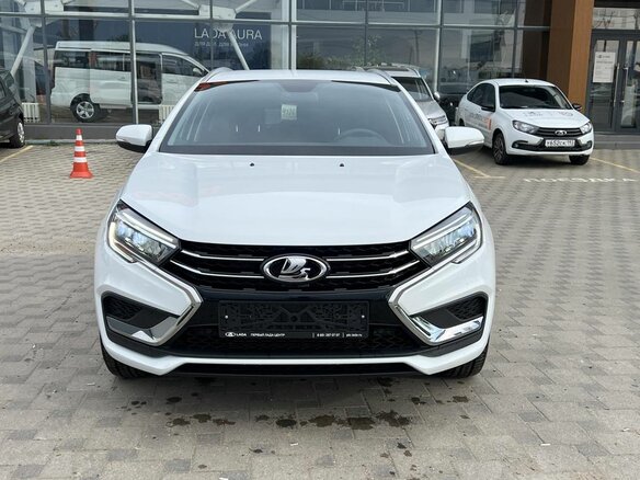 2026 Lada (ВАЗ) Vesta SW I Рестайлинг (NG), белый, 1915000 рублей - вид 1