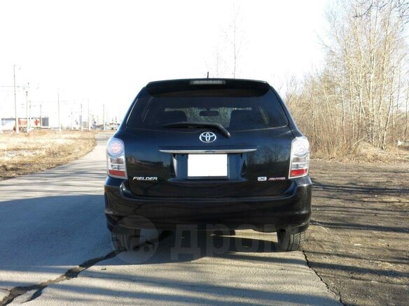 2011 Toyota Corolla Fielder X (E140, E150) Рестайлинг, чёрный, 750000 рублей - вид 8