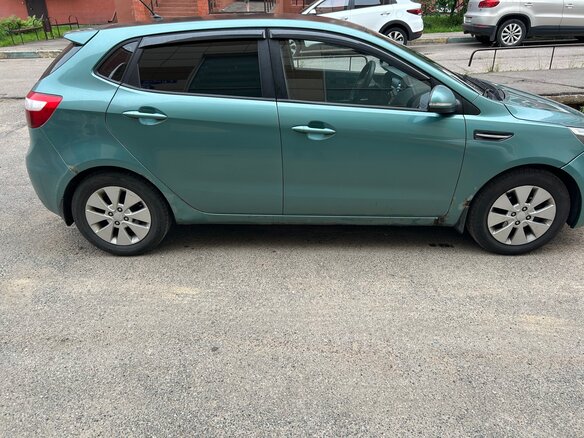 2012 Kia Rio 4-speed III, зелёный - вид 1