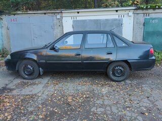 2013 Daewoo Nexia I Рестайлинг, чёрный, 170000 рублей, вид 3