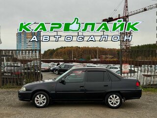 2012 Daewoo Nexia I Рестайлинг, чёрный, 199000 рублей, вид 3