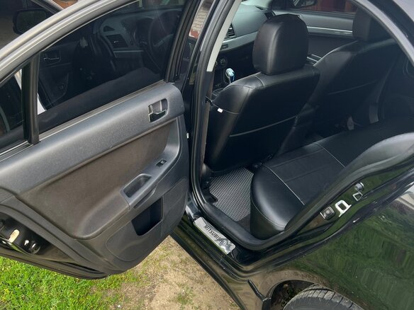 2008 Mitsubishi Lancer X, чёрный, 700000 рублей - вид 9