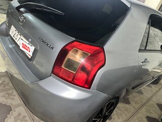 2003 Toyota Corolla IX (E120, E130), серебристый, 700000 рублей, вид 4