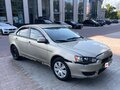 2007 Mitsubishi Lancer X, бежевый, 330000 рублей - вид 3