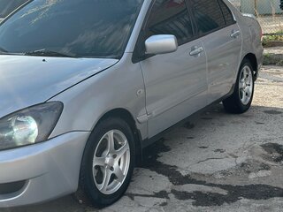 2006 Mitsubishi Lancer IX Рестайлинг, серебристый, 299999 рублей, вид 1
