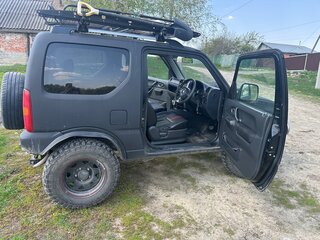2009 Suzuki Jimny Kei car III Рестайлинг 1, чёрный, 650000 рублей, вид 4
