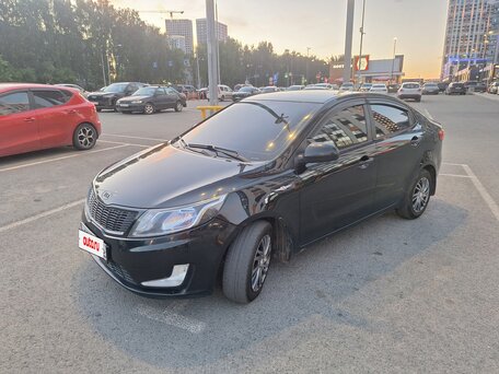 2012 Kia Rio 5-speed III, чёрный, 780000 рублей, вид 5