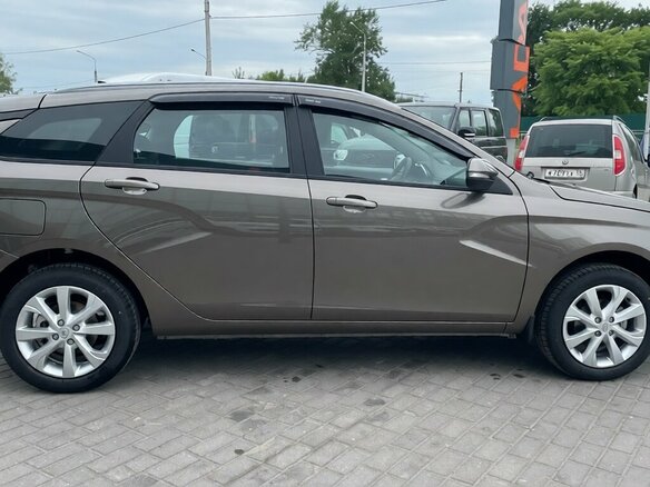 2026 Lada (ВАЗ) Vesta SW I Рестайлинг (NG), коричневый, 2005000 рублей - вид 4