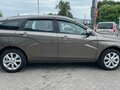 2026 Lada (ВАЗ) Vesta SW I Рестайлинг (NG), коричневый, 2005000 рублей - вид 4