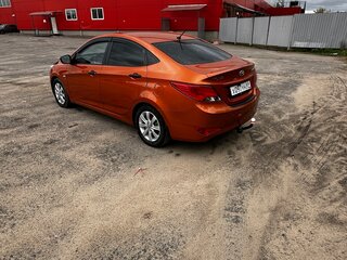 2015 Hyundai Solaris I Рестайлинг, оранжевый, 750000 рублей, вид 3