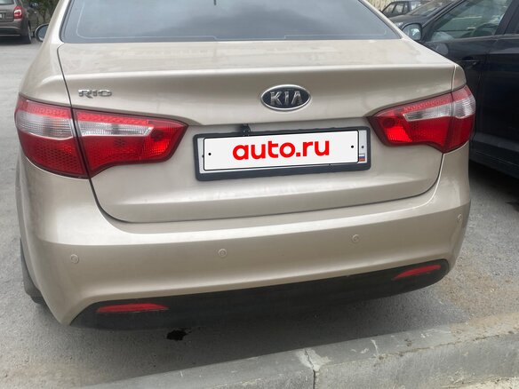 2012 Kia Rio 4-speed III, бежевый, 930000 рублей - вид 2