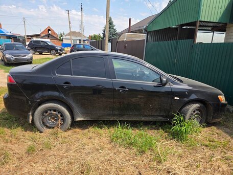 2010 Mitsubishi Lancer X, чёрный, 438000 рублей, вид 2