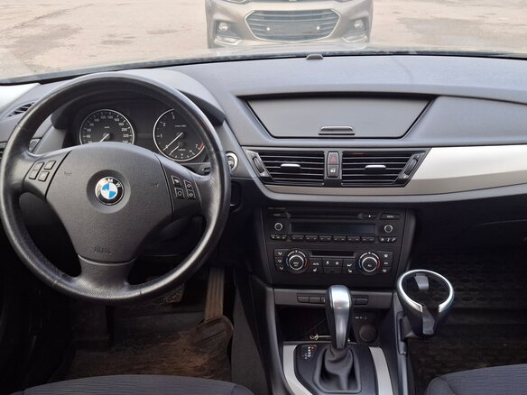 2014 BMW X1 18i I (E84) Рестайлинг, коричневый, 1599000 рублей - вид 6