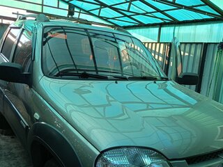 2011 Chevrolet Niva I Рестайлинг, серый, 450000 рублей, вид 3