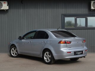 2012 Mitsubishi Lancer X Рестайлинг, серебристый, 659888 рублей, вид 4