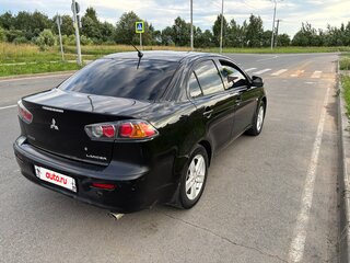 2010 Mitsubishi Lancer X, чёрный, 720000 рублей, вид 4