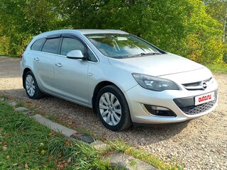 2013 Opel Astra J Рестайлинг, серебристый, 850000 рублей, вид 4