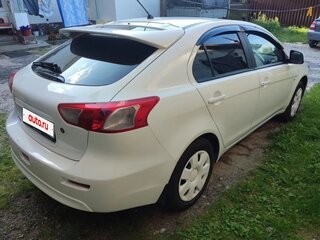 2009 Mitsubishi Lancer X, белый, 655000 рублей, вид 3