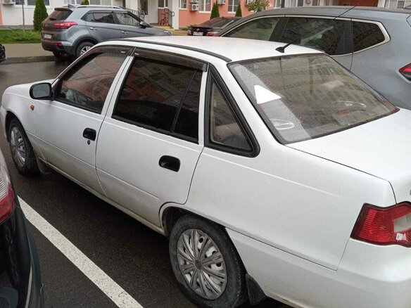 2010 Daewoo Nexia I Рестайлинг, белый, 199000 рублей - вид 1