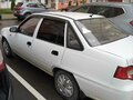2010 Daewoo Nexia I Рестайлинг, белый, 199000 рублей - вид 1