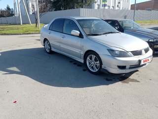 2006 Mitsubishi Lancer IX Рестайлинг, серебристый, 380000 рублей, вид 2