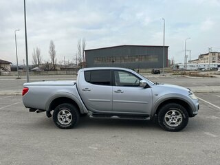 2014 Mitsubishi L200 IV Рестайлинг, серебристый, 1500000 рублей, вид 4