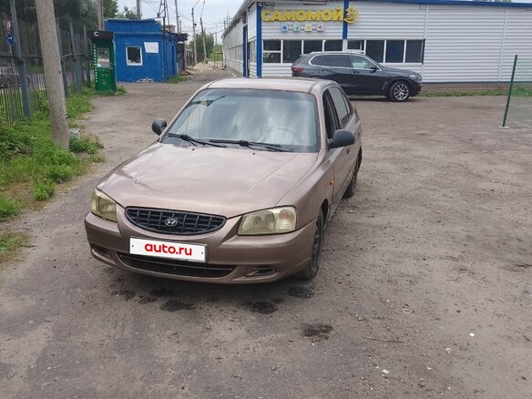 2004 Hyundai Accent ТагАЗ II, коричневый - вид 1