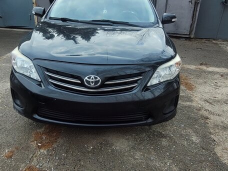 2011 Toyota Corolla X (E140, E150) Рестайлинг, чёрный, 900000 рублей, вид 3