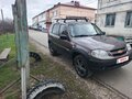 2018 Chevrolet Niva I Рестайлинг, коричневый, 700000 рублей - вид 1