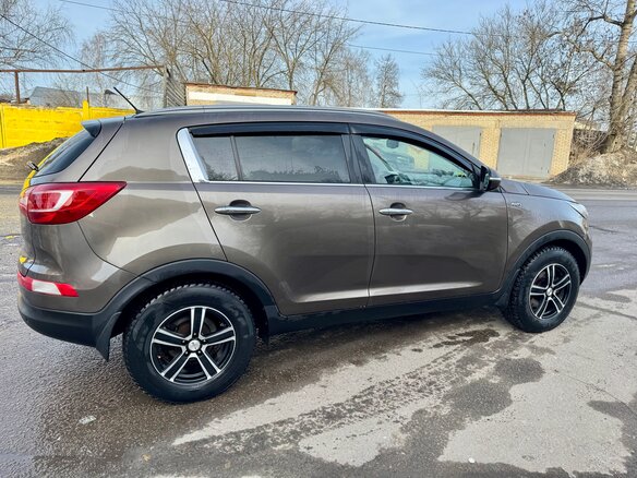 2012 Kia Sportage III, коричневый, 1660000 рублей - вид 1