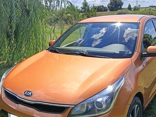 2017 Kia Rio IV, оранжевый, 1290000 рублей, вид 2