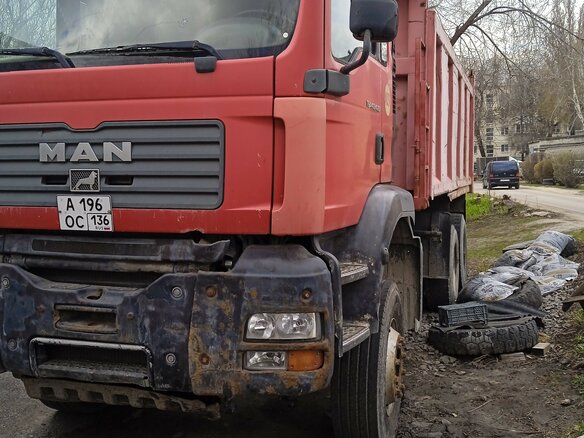 2011 MAN Самосвалы TGA, красный, 1800000 рублей - вид 2