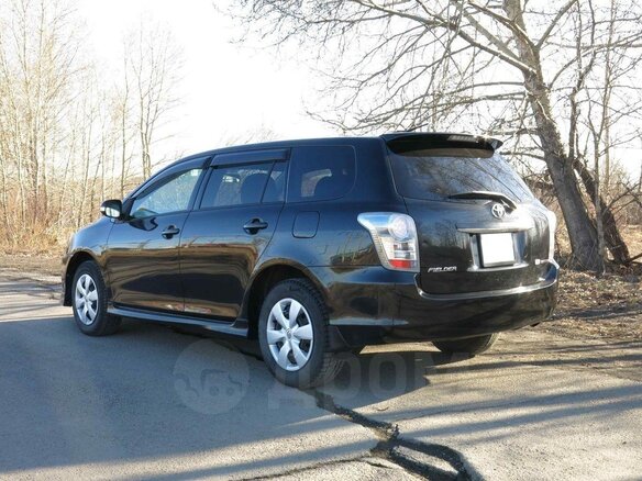 2011 Toyota Corolla Fielder X (E140, E150) Рестайлинг, чёрный, 750000 рублей - вид 9