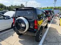 2010 Suzuki Jimny Kei car III Рестайлинг 1, чёрный - вид 6