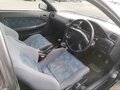 1991 Toyota Corolla VII (E100), чёрный, 500000 рублей - вид 6