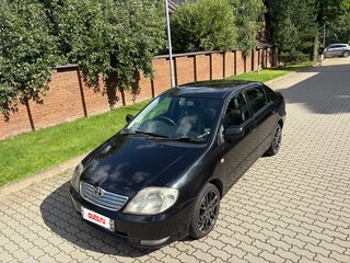 2003 Toyota Corolla IX (E120, E130), чёрный, 450000 рублей, вид 3