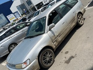 1999 Toyota Corolla VII (E100), серебристый, 210000 рублей, вид 1