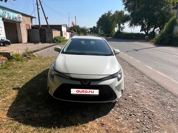 2021 Toyota Corolla XII (E210), белый, 1750000 рублей - вид 1